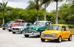 How Does Bring a Trailer Work 2 A line of vintage cars at an auto auction waiting for transport